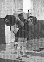 Once the bar is lifted past the knees, the knees come slightly forward once more. The lifter then drives upward explosively keeping the arms straight. 3.