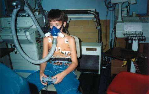 Figure 1. Video game data collection using a metabolic cart and an electrocardiograph. in young children, who constitute a large video game consumer population.