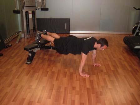 Exercise Descriptions Workout A Decline Pushup Keep the abs braced and body in a straight line from toes (knees) to shoulders.