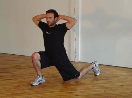 Prisoner Diagonal Lunge Stand with your feet shoulder-width apart and hands clasped behind your head.