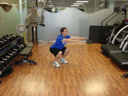 Start the movement at the hip joint. Push your hips backward and sit back into a chair.