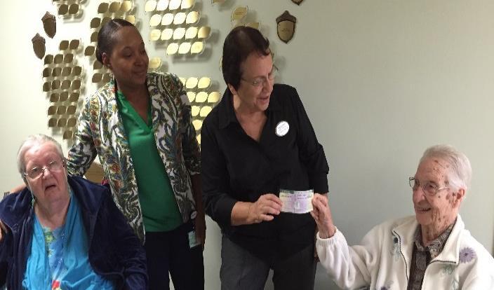 Fundraising Residents presented a check to Dorothy