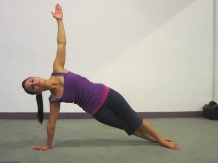 Ab Twist Reach Begin on your side. Place right hand down on the floor, opposite hand extended straight up to the sky. Extend both legs straight out onto the floor.