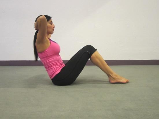 Core - V Sit straight up with knees bent, feet flat on the floor, Interlace hands behind head. Keep your head up and do not tuck chin to chest or roll shoulders forward.