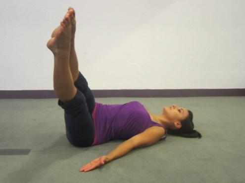 Ab Twist Sweep Lie on your back; bring legs straight up towards the sky. Keep shoulders down and arms straight out, palms facing up.