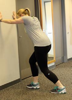 lean in the direction of the back leg until a stretch is felt in the outside of the hip.