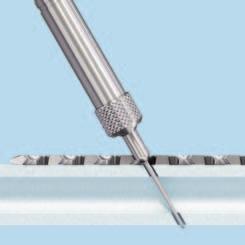 Insert Plate-Shaft Screws After fixing the distal portion of the lateral and medial plates, determine where locking or cortex screws will be used in the shaft.
