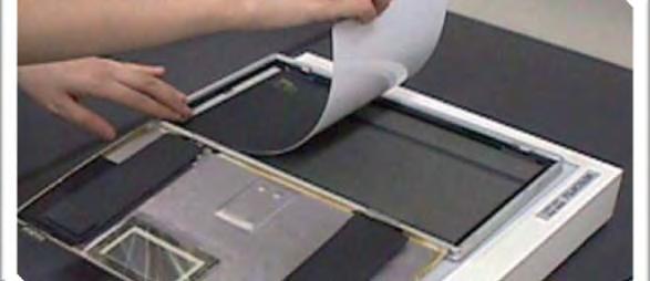 Figure19: Loading a photostimulable phosphor plate into a soft cassette.