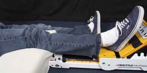 SUPINE QUAD EXTENSION 1. Orient the machine with the Load Adjustment Knobs facing the patient. 2. Stabilize the machine. 3. Set Footplate to the appropriate angle for the patients comfort. 4.