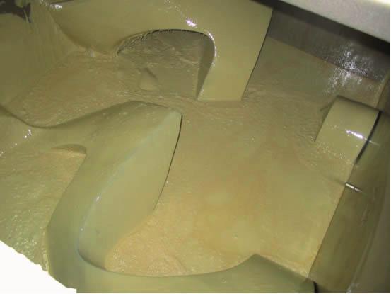 Melted gum base inside the Winkworth Z Blade Mixer Easy Release Of The Gum Base Mix For continuous processes the hot liquid gum base is discharged into a heated and agitated storage hopper, such as a