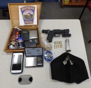 Whitman Police seized a gun, more than 60 rounds of ammunition and several other items from a vehicle following the arrest of a Taunton man, who was allegedly