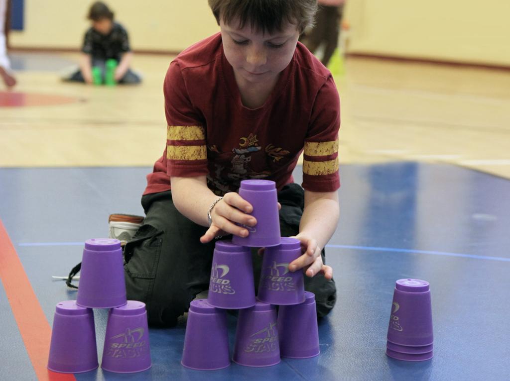 Indy 500 Race around the track for partner fitness fun Grades K+ Equipment One set of Speed Stacks for each stacker pair One set of Speed Stacks Stack Spots Set Up Create a large oval randomly