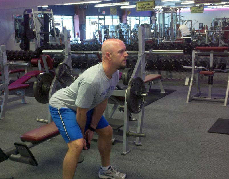 Workout B " KB/DB Swings Stand with your feet wider than shoulder-width apart.