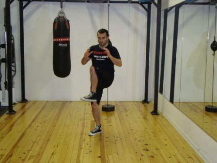Workout C Punch-Kick Combo Stand with feet hip-width apart and knees slightly