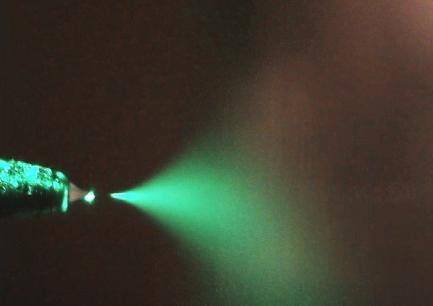 photons emitted by a laser on a sample