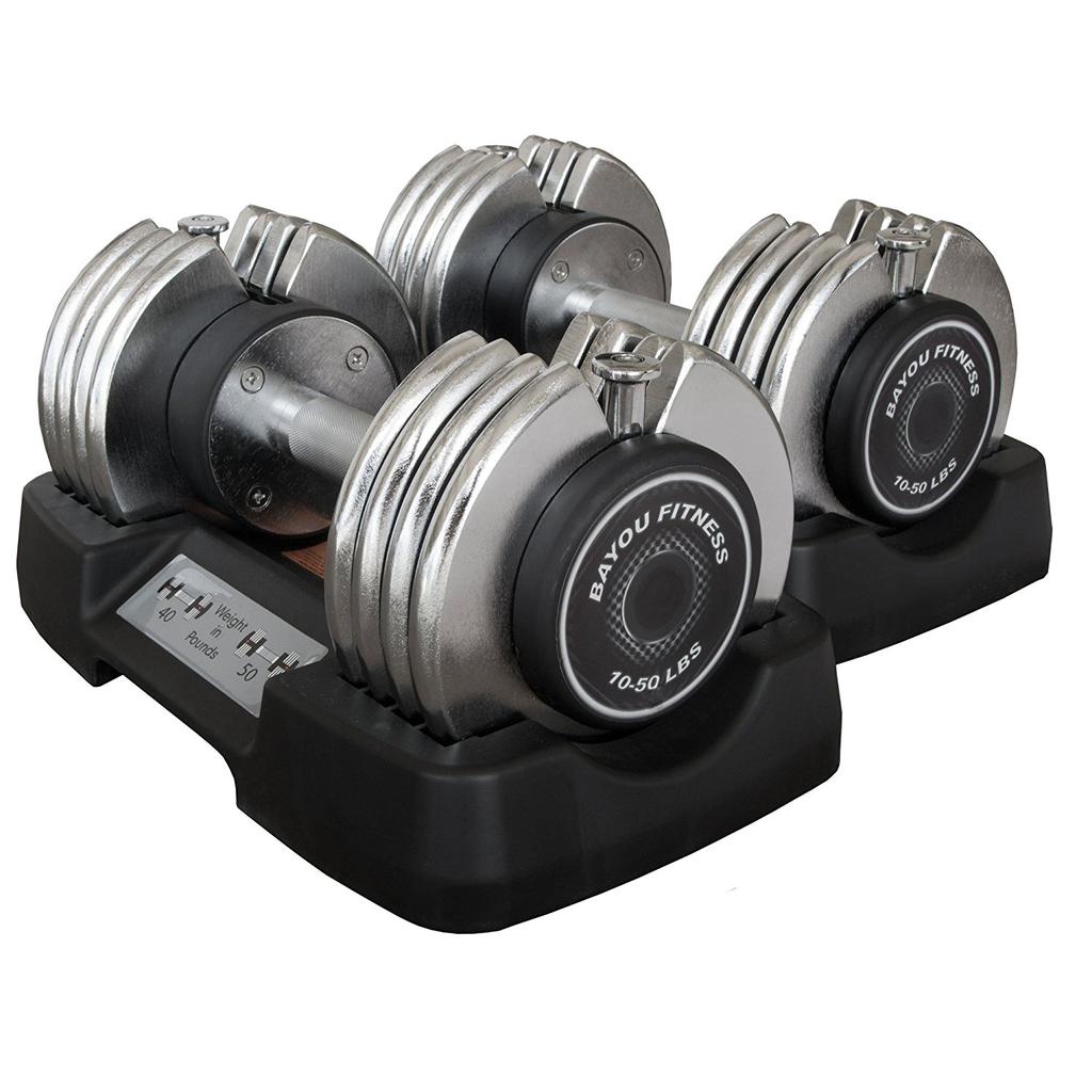 Lift from 10 to 50 lbs Two 50 lb. adjustable dumbbells and storage trays $540.