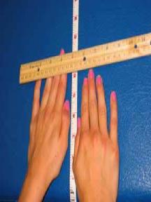 Position must be held for three seconds. The second tester will place a ruler across at the farthest point of the reach (Figure 5).