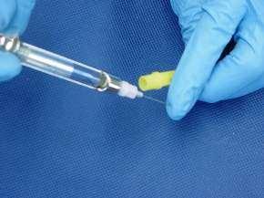 Removal of the capped needle from the syringe Risks When a capped needle is removed from the