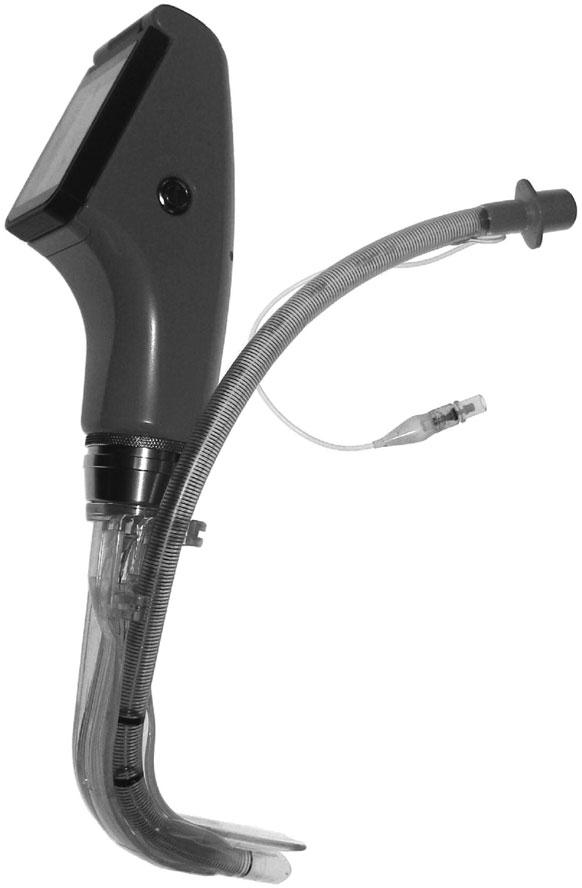 Pentax-AWS vs Macintosh laryngoscope Fig 1 The Pentax-AWS (Tokyo, Japan). It consists of a disposable transparent blade (PBLADE w ), a 12 cm cable with a CCD camera, and a 2.4-in.