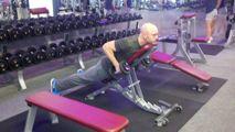 Grab a dumbbell in each hand and bring your shoulder blades together, and row the dumbbells up