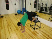 Workout B Pike Pushup Put your feet on a high box.