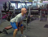 Hold a single Kettlebell or dumbbell in both hands in front of your body at