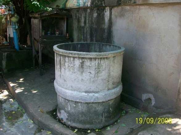 cement jars storing water for drinking
