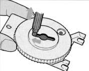3. With the used wax filter attached to the HF3 tool, insert the