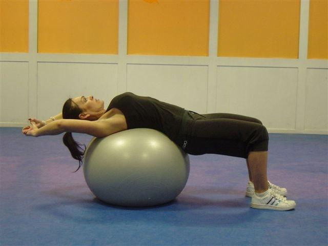 12 Stability Ball Crunch level 2 Abdominals Place the ball underneath your lower back.