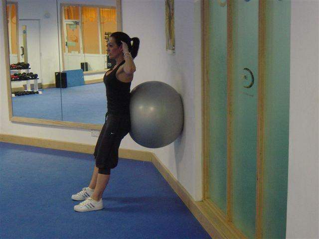 13 Wall Squat Quads Glutes Place the stability ball by your lower back Place