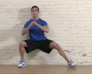 Start in a seated position with your back up against a wall and your