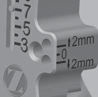 If needed, use the +2mm/-2mm holes to adjust the flexion space as appropriate (Fig. 37). Fig.