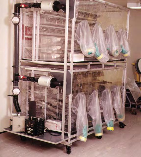 K. GLOVE BOXES Move all materials to be used for the experiment from the side chamber to the main chamber at one time to reduce the amount of side reaching.
