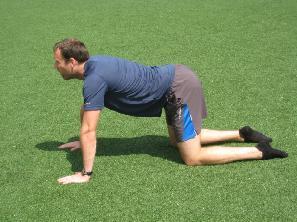Value for runners: This modification of the basic plank engages your hip flexor and quads to place you in a more running specific