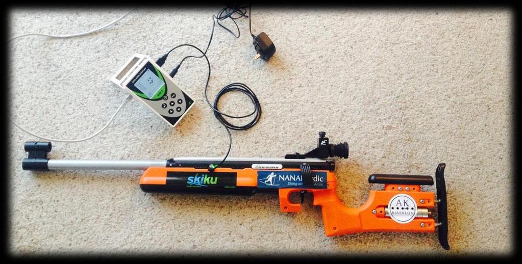 You can also charge the rifle using a cord that connects from the handheld computer to the rifle. Turn on via power button, top and center. c. Rifle powered via cord from handheld computer or plugged into USB wall socket (not included).