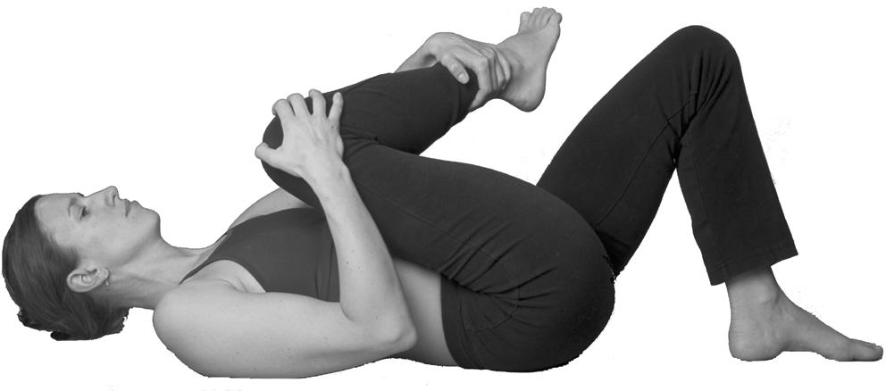 2) Continue to hold your right knee in place (this is the stretch) THEN grab your right ankle with your left hand and slowly pull toward your body (this is the twist).