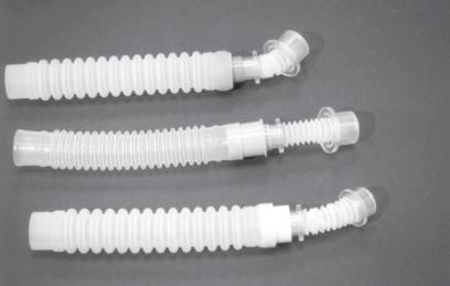 Swivel Adapters: Swivel adapters attach directly to the tracheostomy tube and then slope at a 45 angle (Fig. 7).