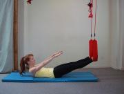 Inhale: Prepare Exhale: Flex the spine sequentially and flex the knees,