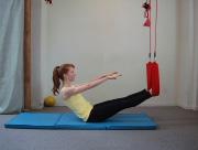 De-rotate it and lengthen the spine vertically and reach the arms by the ears