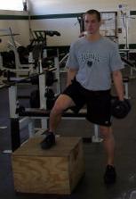 Lateral Step Ups Hold a dumbbell in each hand with a box to your side.