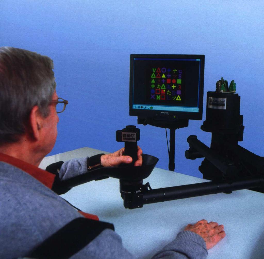 Figure 1.1: The Inmotion 2 Shoulder-Elbow Robot is used in upper extremity physical rehabilitation therapies and only allows 2D shoulder-elbow movements [1]. 1.1 Thesis Contributions The objective of this thesis was to extend existing literature in a number of ways.