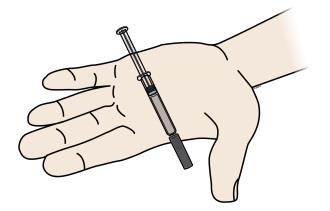 If prefilled syringe does not release from tray, gently press on back of tray Do not pick up