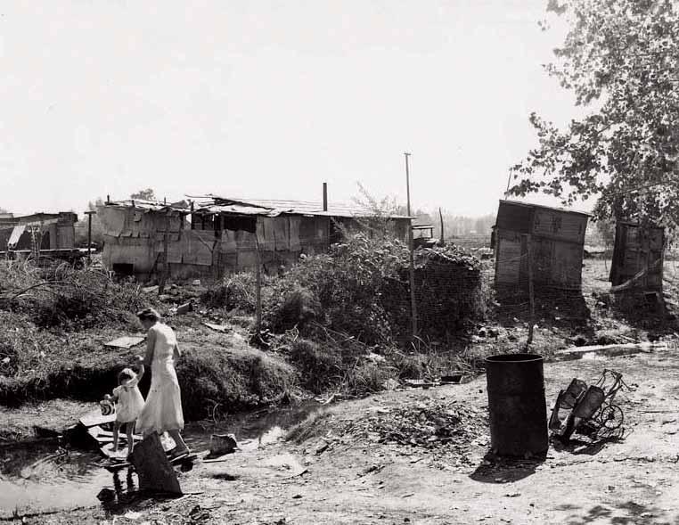 DOCUMENT 1 - Photograph of a squatter camp in California, 1936.
