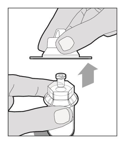7. Hold the plunger rod at the circular disk. Place the tip of the plunger rod into the end of the syringe. Turn clockwise until it is securely attached.
