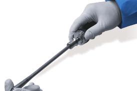 Ensure the handle is in the forward position Press the screw into the distal tip of the shaft Prior to inserting the Expandable Screw, the expansion peg