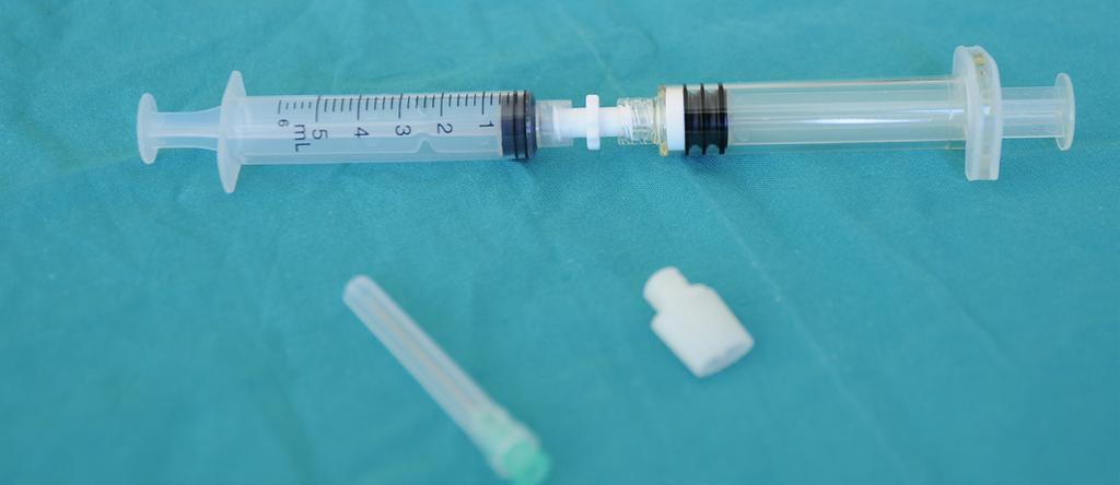 Open the syringe containing the DAC powder.