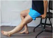 Quadriceps set Lie down or recline with a small towel roll under your ankle.