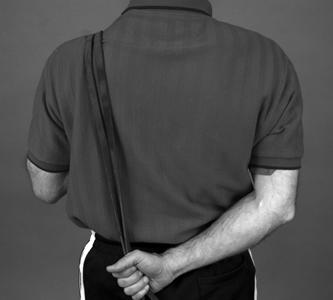 Place the hand to be stretched in the position shown in Picture 6. It is normal to feel a pull around the shoulder joint and possibly down into the upper arm.