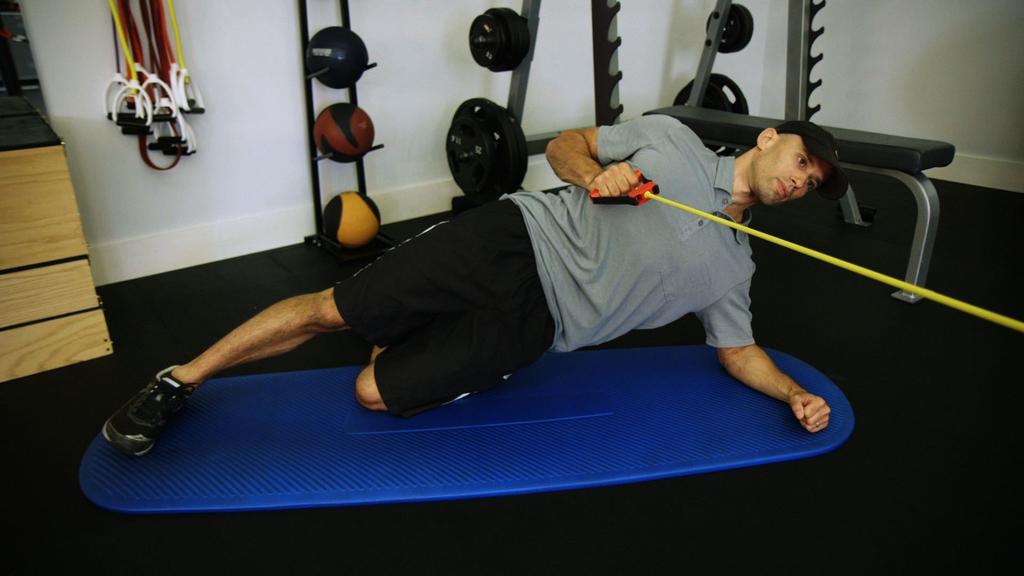 Side Plank with Single Arm Row Place your supporting shoulder directly above your supporting elbow.