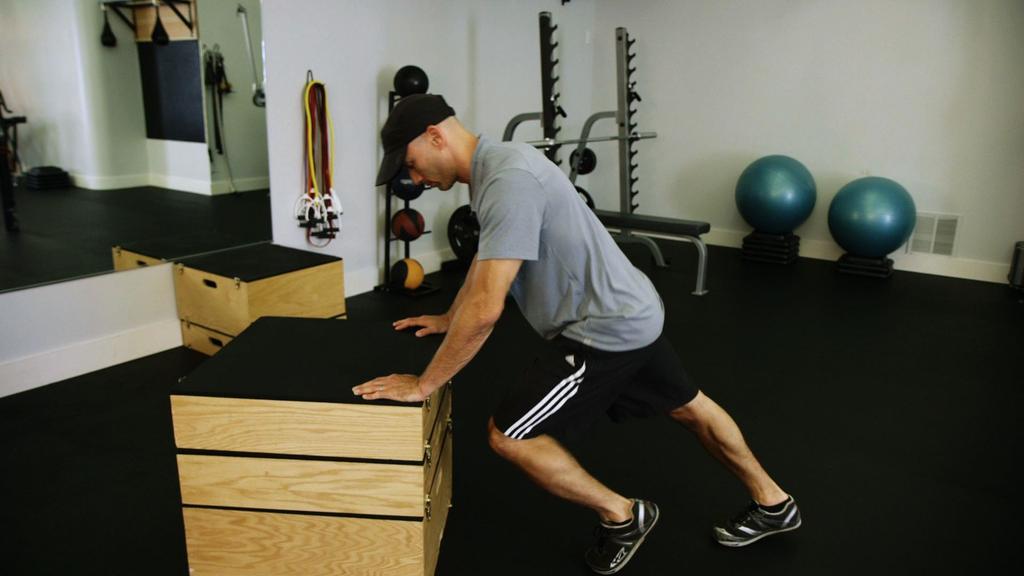 Mountain Climbers Place hands on the floor or an elevated surface. Keep your shoulders directly over your hands.